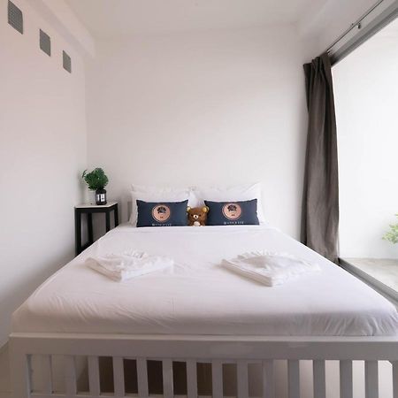 RoomQuest Sukhumvit 50 Bangkok Extérieur photo